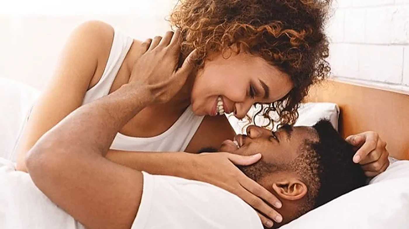 Happy couple enjoying closeness, supported by Alpha Honey men's vitality gummies
